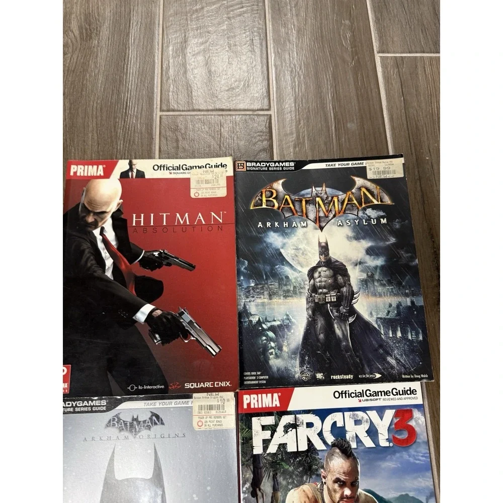 Lot of 4 Official Video Game Guides Brady/Prima Batman, Hitman, Far Cry
